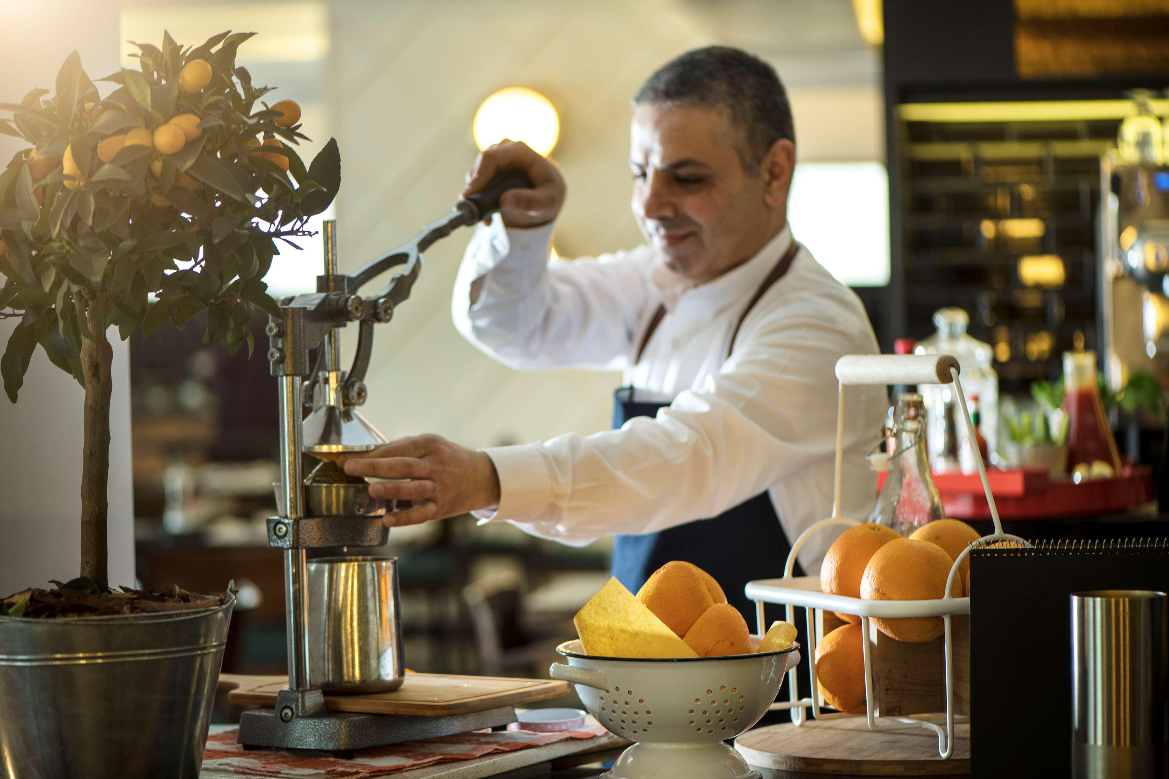 Radisson Blu Hotel, Beirut Verdun Exterior photo A bartender at work