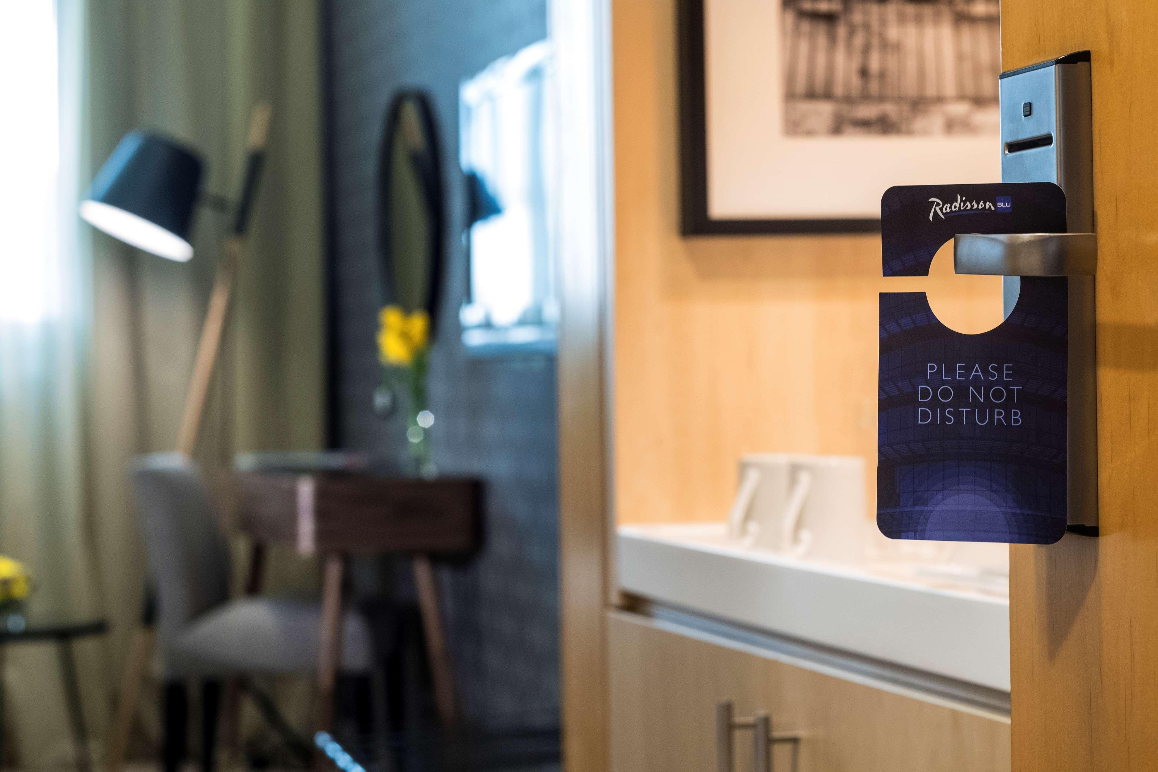 Radisson Blu Hotel, Beirut Verdun Exterior photo A "Do Not Disturb" sign in a hotel room